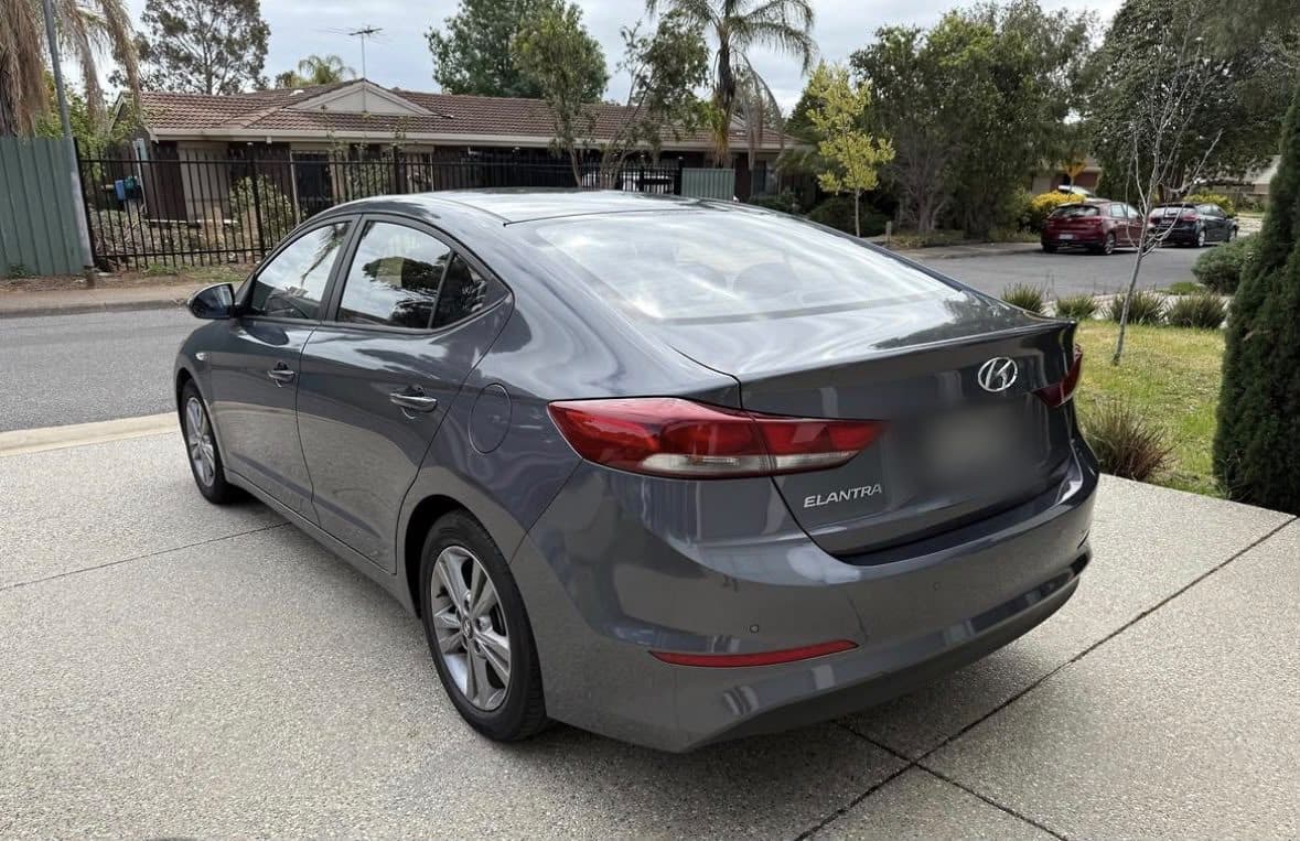 Grey 2017 Hyundai Elantra sedan parked on a driveway, photo 2