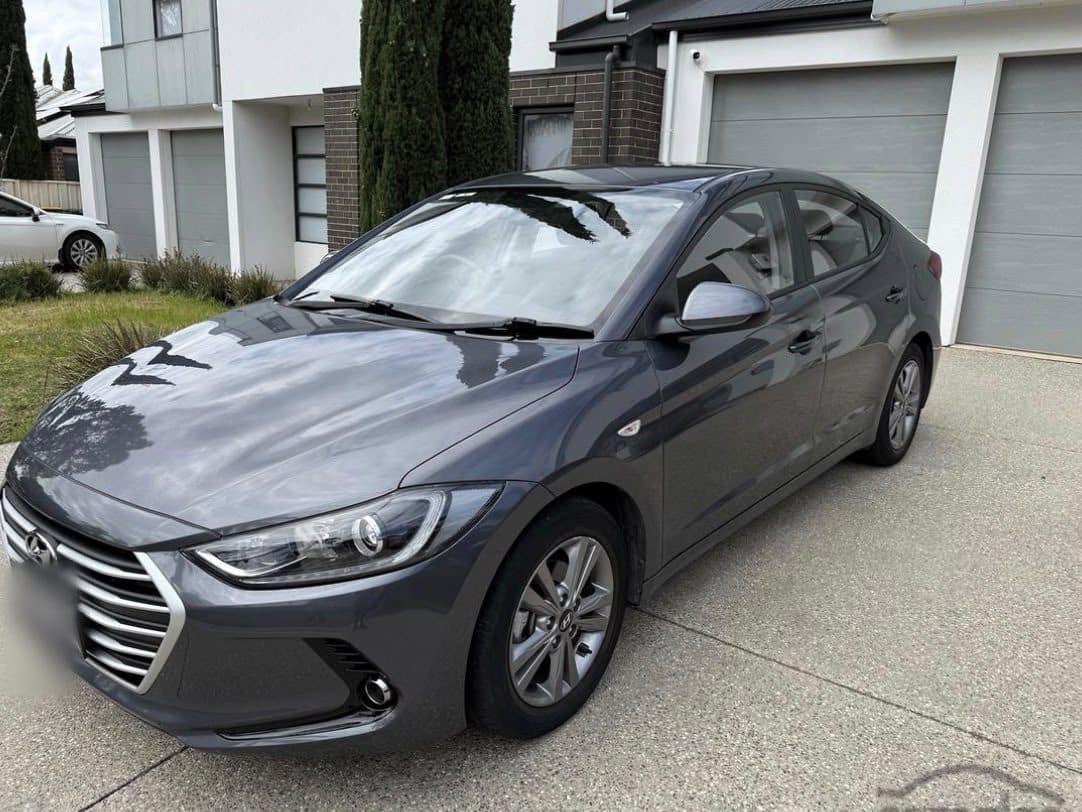 Grey 2017 Hyundai Elantra sedan parked on a driveway