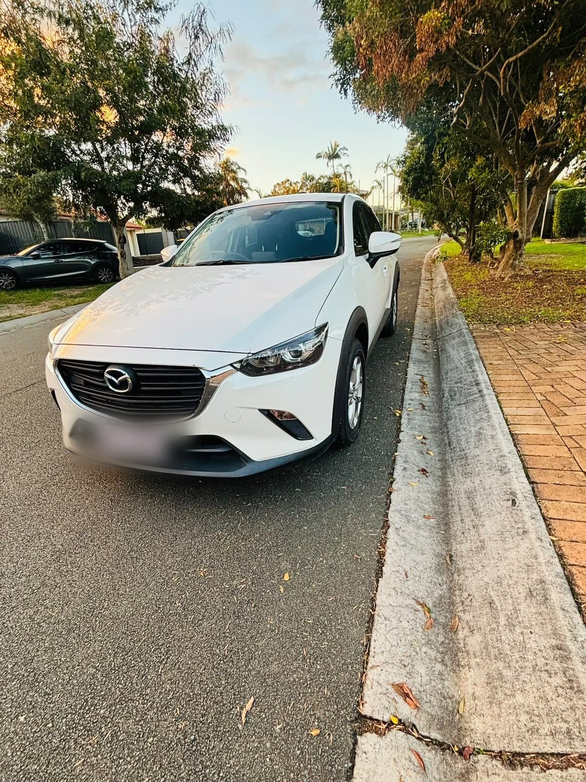 White 2018 Mazda CX-3 parked on a suburban street, photo 2