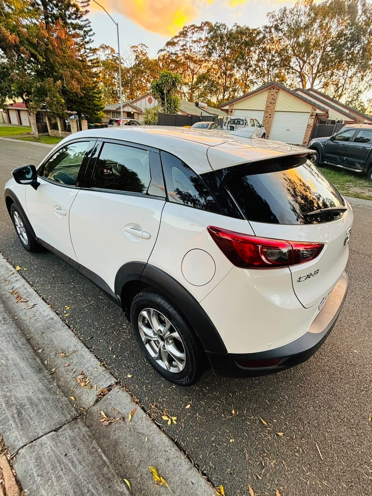 White 2018 Mazda CX-3 parked on a suburban street, photo 3