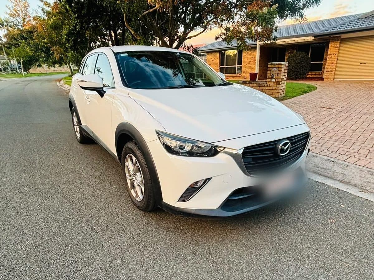 White 2018 Mazda CX-3 parked on a suburban street